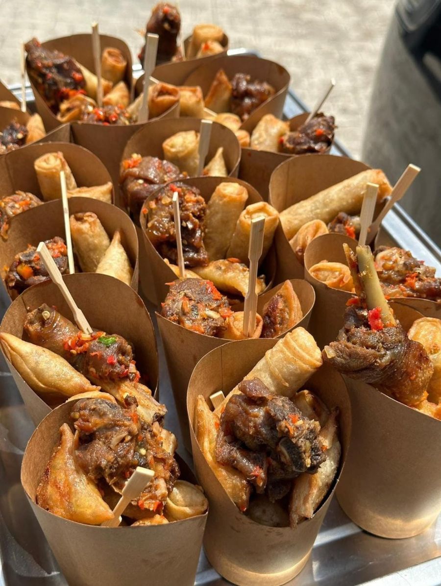 Small chops cones with peppered meat, spring rolls and samosas